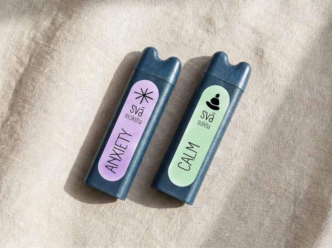 Two svāroma aromatherapy inhalers on linen -- calm and anxiety blends compared