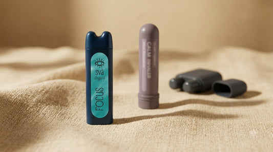 Multiple aromatherapy inhalers on a linen surface, natural light, comparison editorial