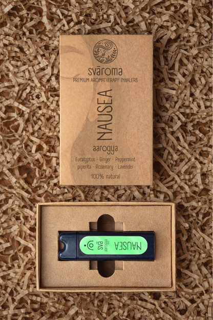 Svaroma Nausea aromatherapy inhaler in eco-friendly brown box packaging with inhaler device inside, designed to ease discomfort. Blend includes Eucalyptus, Peppermint, Rosemary, and Lavender.