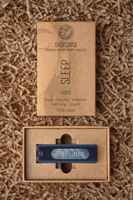 svā nidra (Sleep) aromatherapy inhaler with its svāroma box packaging, a blend of orange, ylang-ylang, sandalwood, lavender, sweet orange and bergamot