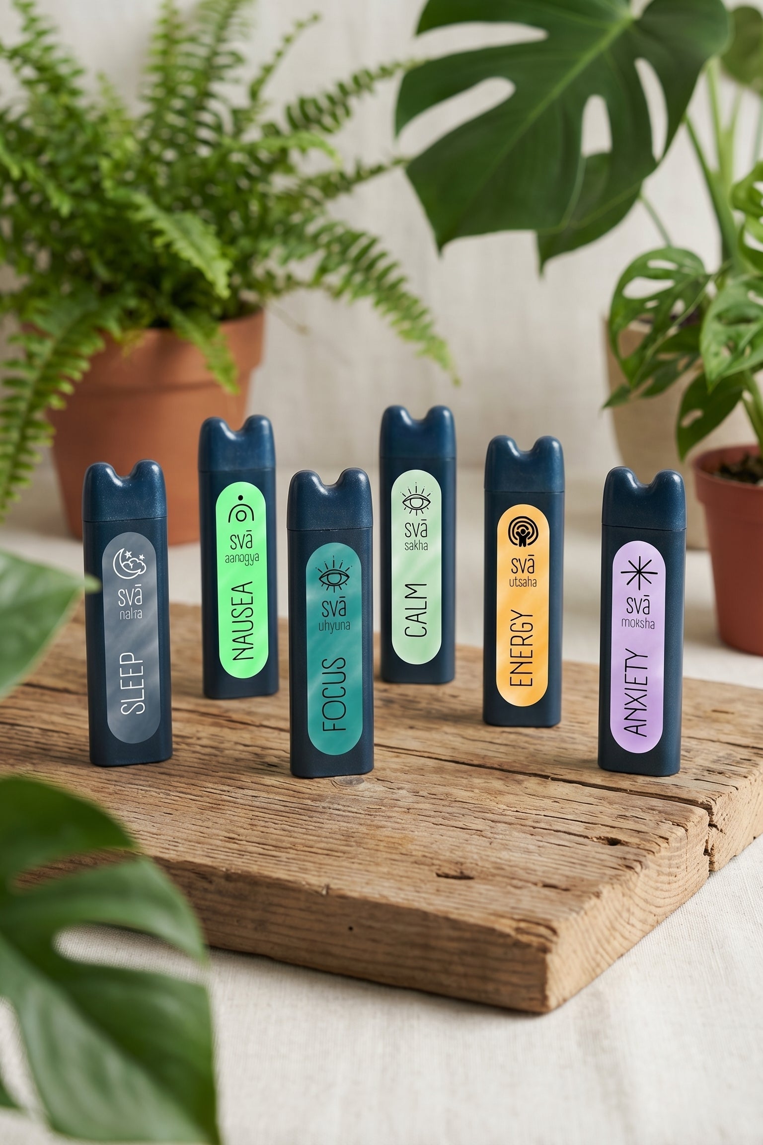 Natural aromatherapy inhalers for focus, calm, energy, sleep, calm, and anxiety relief on wooden surface